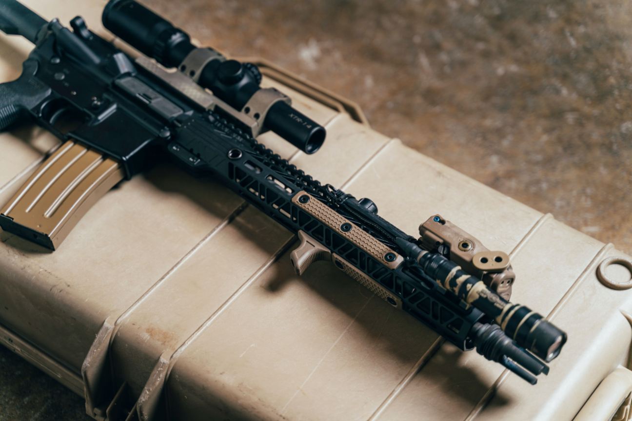Beige and black AR-15 with the best upgrades and accessories